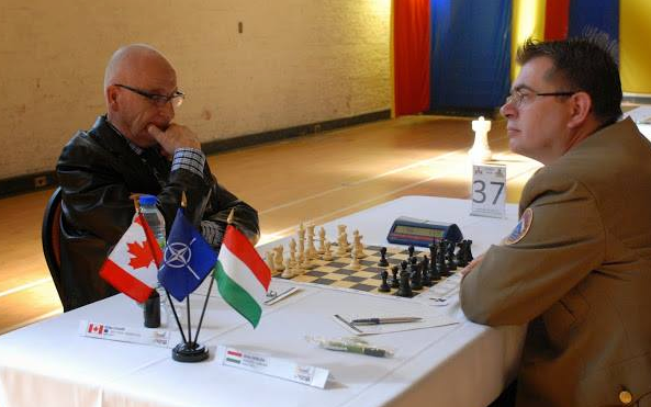 En première ronde contre un joueur de la Hongrie. En première ronde contre un joueur de la Hongrie.
