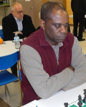 guimonIya Gervais Iyamuremye et Michel Guimond en arrière-plan.